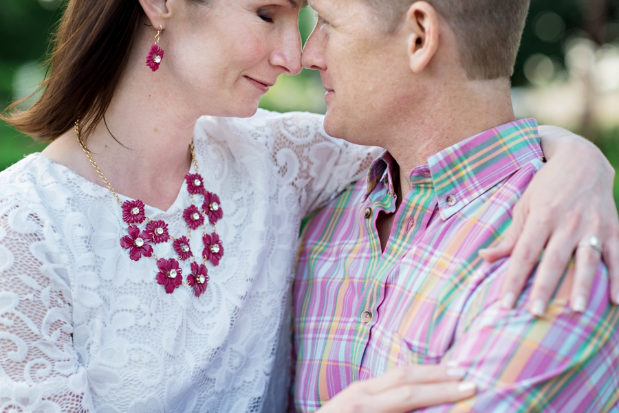 A loving couple get close in a philadelphia park.